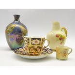 Royal Worcester jug painted with flowers on a blush ivory ground, H12cm,