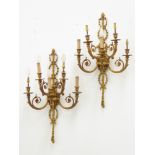 Arnold Montrose - pair gilt metal five branch wall sconces,