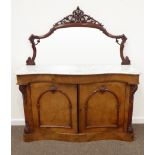 Victorian walnut serpentine chiffonier, pierced and carved cresting above shaped mirror back,