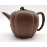Chinese terracotta teapot of circular design with Dog of Fo lift and loop handle H11cms