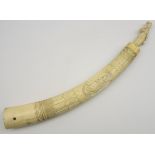 19th Century Burmese ivory tusk carved with figures,