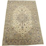 Persian Kashan rug carpet, ivory field decorated with interlaced foliage,