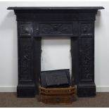 Victorian cast iron fireplace, incised mantel piece over fluted and flower head frieze,