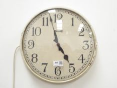 Early 20th century 'Ferranti' electric wall clock, circular painted brass case with Arabic dial,