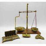 Set of counter top brass scales to weigh 1lb, on rectangular mahogany base with weights,