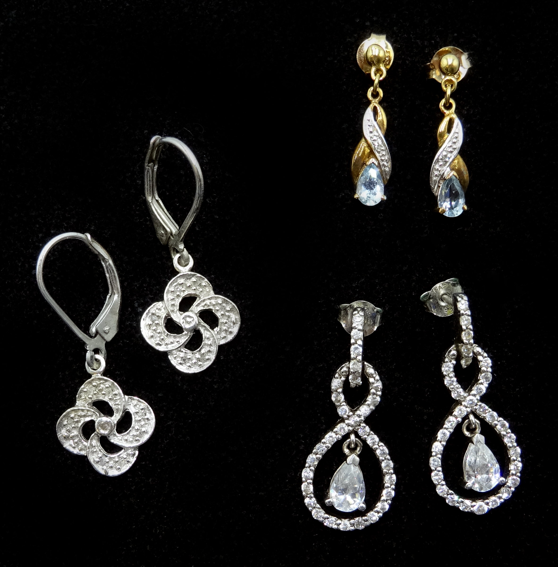 Pair of 9ct gold aquamarine and diamond pendant earrings, stamped 375,