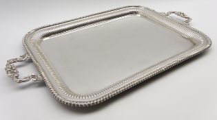 Silver plated oblong 2 handled tray with gadrooned edge and shell moulded handles 56cm x 42cm
