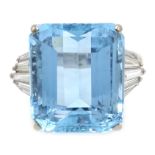 18ct white gold emerald cut aquamarine ring, with tapering baguette diamond shoulders,