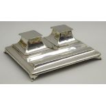 Silver oblong inkstand with 2 covered inkwells and pen tray on shaped supports 19cm x 14cm