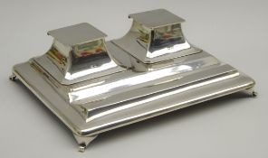 Silver oblong inkstand with 2 covered inkwells and pen tray on shaped supports 19cm x 14cm