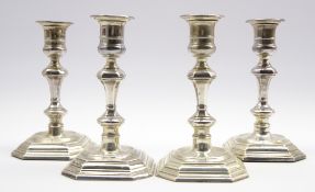 Set of four Georgian design silver candlesticks,