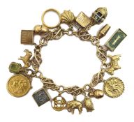 9ct gold fancy link bracelet, with sixteen 9ct gold charms including Scottie dog,