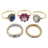 Three gold stone set cluster rings and two stone set eternity rings,