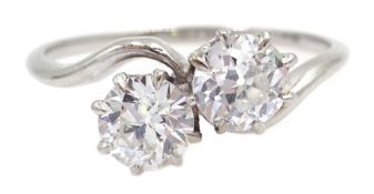 Platinum (tested) two stone diamond crossover ring, each diamond approx 0.