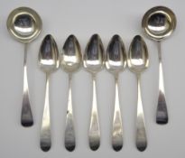 Five George IV Irish silver Celtic Point pattern dessert spoons engraved with a crest Dublin 1827,