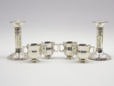 Pair of Edwardian small silver candlesticks H10cm Birmingham 1909 and 4 small silver 2-handled cups