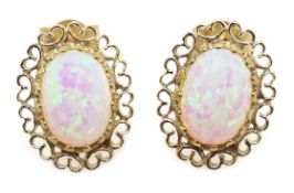 Pair of 9ct gold opal filigree stud earrings,