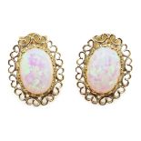 Pair of 9ct gold opal filigree stud earrings,