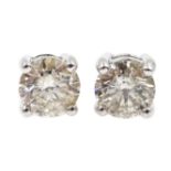 Pair of 18ct white gold diamond stud earrings, stamped 750, diamonds approx 1.