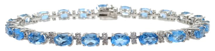 18ct white gold blue topaz and diamond bracelet, stamped 750, topaz approx 12 carat,