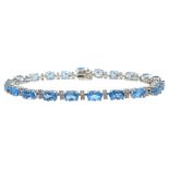 18ct white gold blue topaz and diamond bracelet, stamped 750, topaz approx 12 carat,