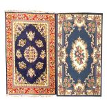 20th century Persian design ground rug, floral medallion on blue field,