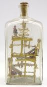 Victorian novelty of a miniature loom with figures in a glass bottle H23cm Condition