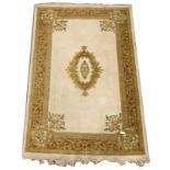 Indian design beige ground rug, floral medallion,