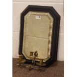 Late 19th century octagonal bevelled wall mirror, the ebonised frame with incised decoration,