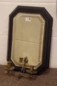 Late 19th century octagonal bevelled wall mirror, the ebonised frame with incised decoration,