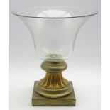 Large glass and painted gilt table centre piece of everted design on a square base H38cm