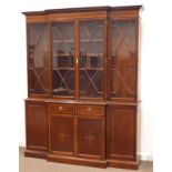 Edwardian mahogany break front bookcase on cupboard,