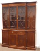 Edwardian mahogany break front bookcase on cupboard,