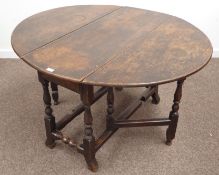 18th century oak drop leaf dining table, oval top above single gate action, drawer to each end,