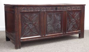 18th century paneled oak coffer blanket chest, front carved with stylised flowers,