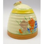 Newport pottery Clarice Cliff 'Crocus' pattern honey pot and cover in the form of a beehive and