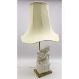 Blanc de chine table lamp in the form of a Chinese guardian lion with pagoda shape shade H80cm