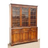 Quality reproduction mahogany bookcase on cupboard,