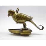 Persian brass cage bird water feeder in the form of a perching bird with engraved decoration H10cm