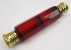 Victorian ruby glass double ended scent flask of panel sided design with engraved gilt metal mounts