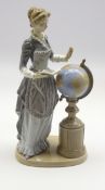 Lladro figure 'School Marm', school mistress holding a book and standing by a globe No.