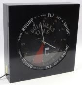Rare Guinness time mains activated light up wall clock,