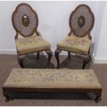 Pair walnut Queen Anne style chairs, cane back with a floral painted panel, needlework seats,