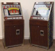 Two 1960s/70s Brenco 'Copper Queen' fruit machines, W61cm, H134cm,