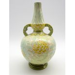 Burmantofts Faience two handled vase with an incised floral design in yellow,