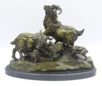 Large bronze group of a Family of Goats on rocky base, mounted on oval marble plinth,