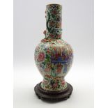 19th Century Cantonese baluster vase with panels of figures and landscapes with applied lizard