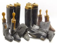 Two pairs of leather riding boots with wooden trees,