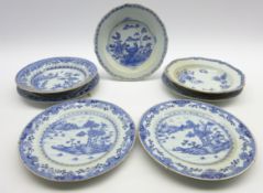 Pair of 18th Century Nankin plates decorated in blue and white with vases, flowers etc D23cm,