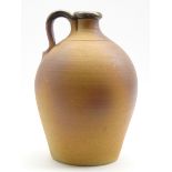 John Leach (b1939) A Muchelney studio pottery flagon with loop handle H38cm Condition